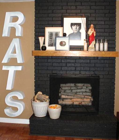 RATS next to Fireplace