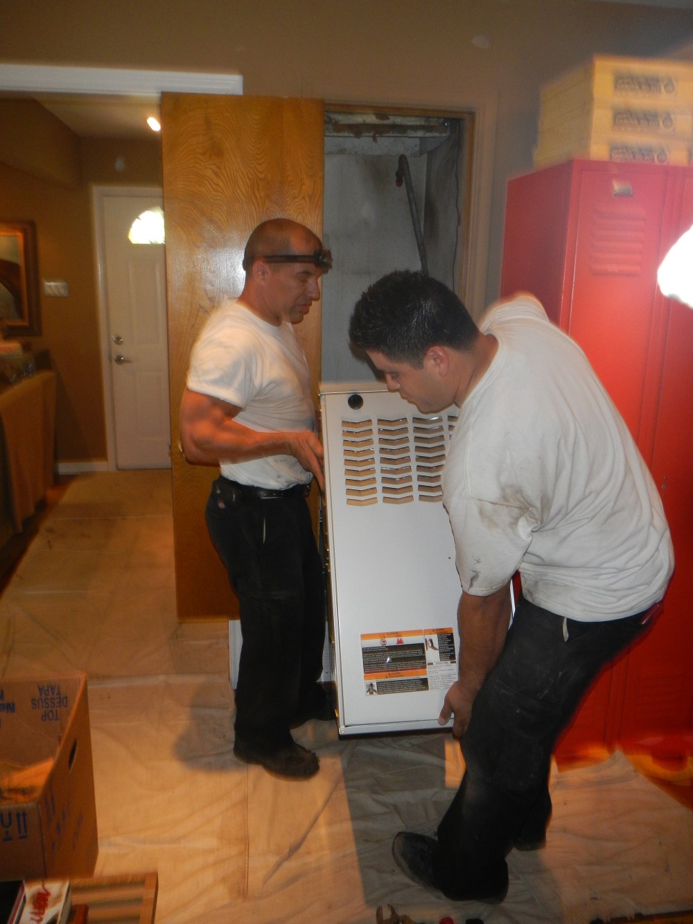 Guys Installing Central Unit