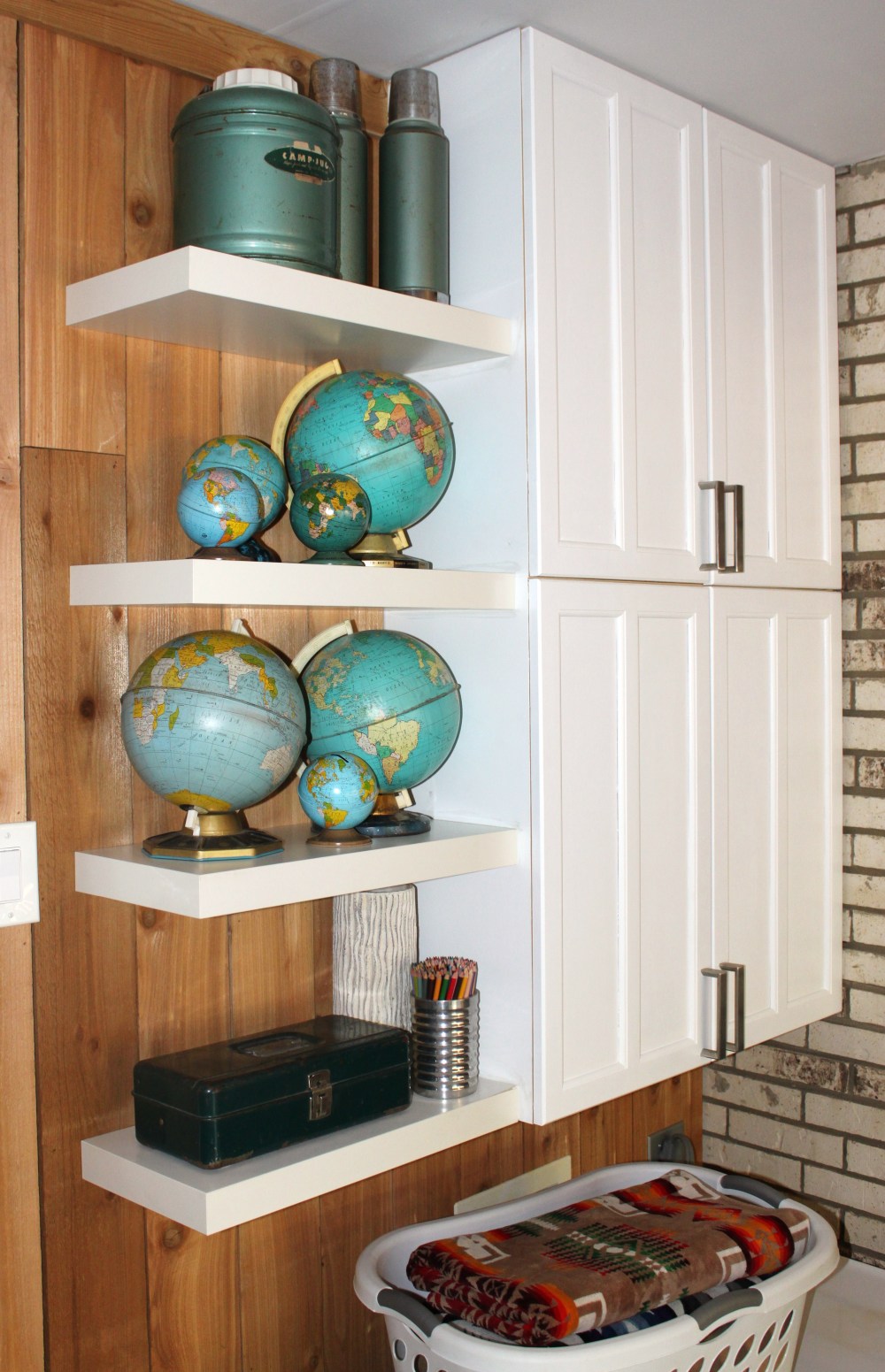 Finishd Cabinets with Shelves and Globe Collection