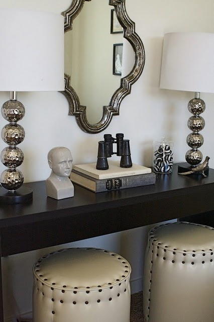 Round Ottomans Under Console