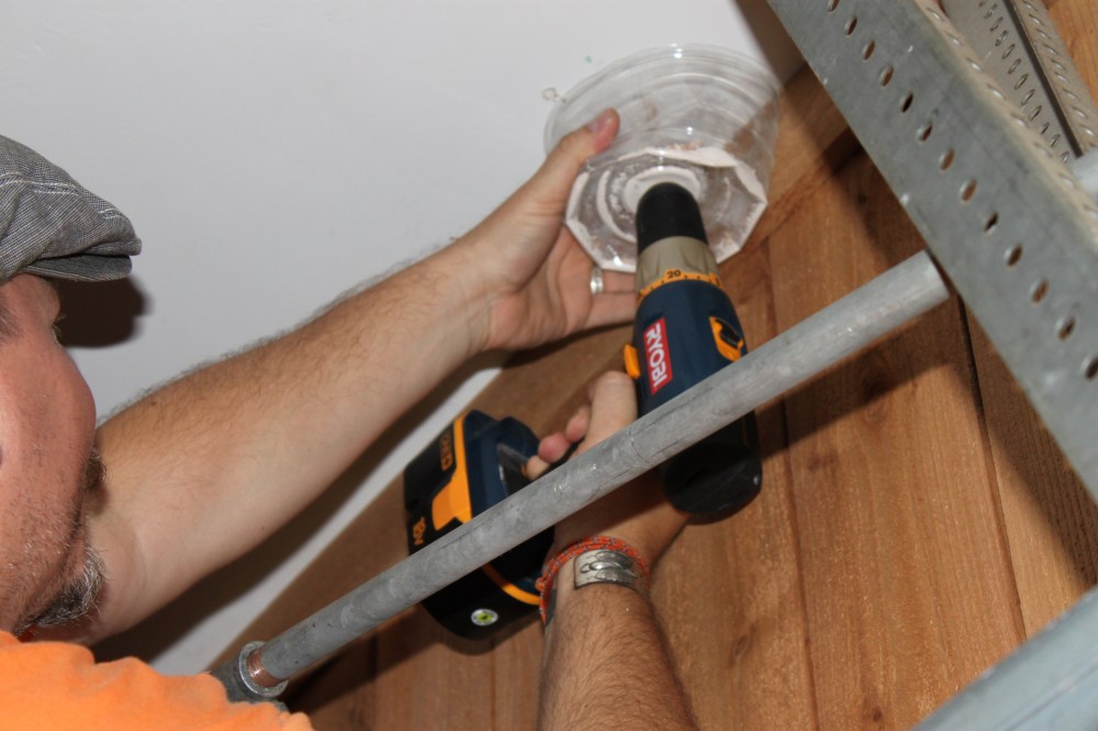 Drilling into the Ceiling with the Plastic Liner