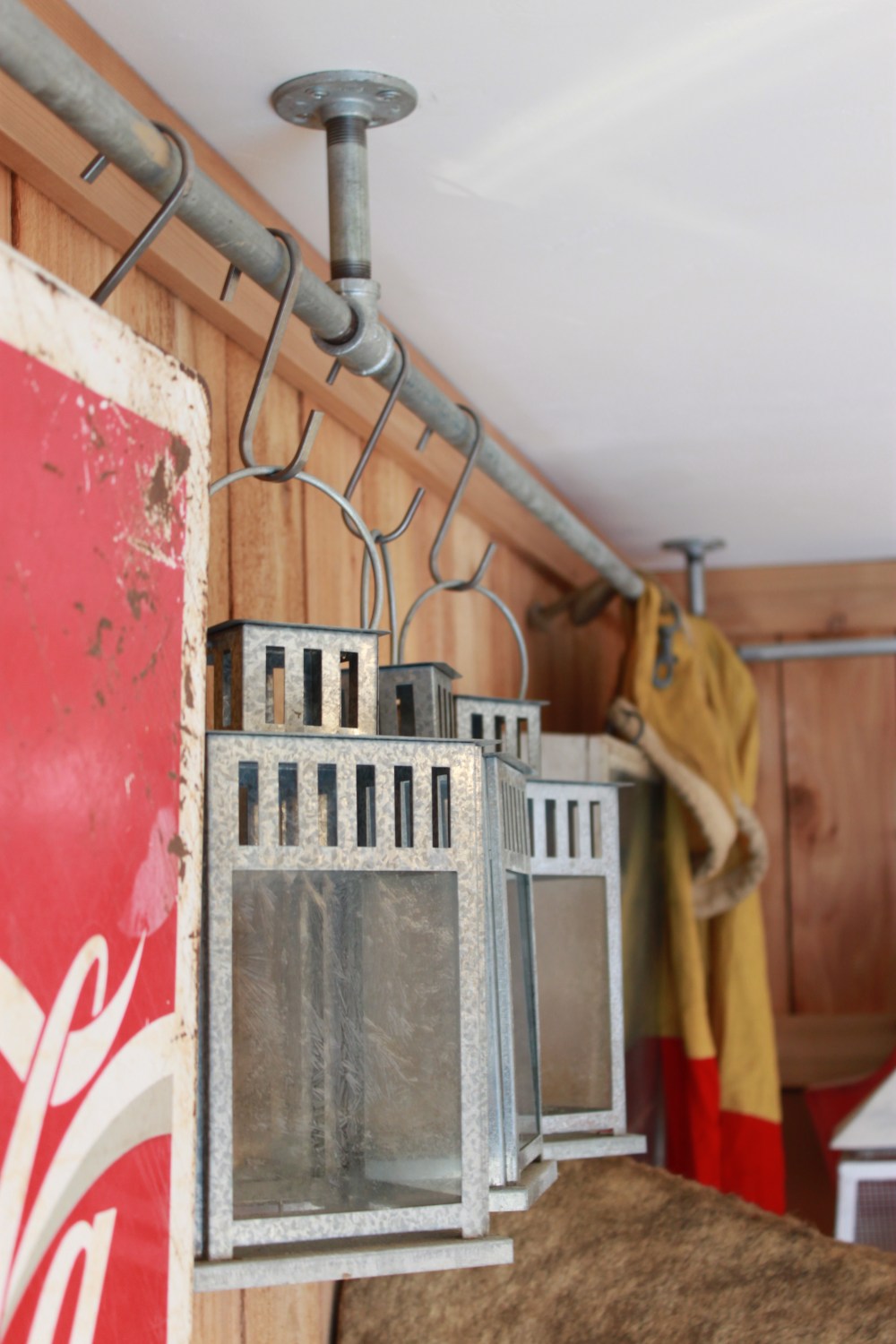 Ikea Lanterns Hanging from Ceiling Pipe