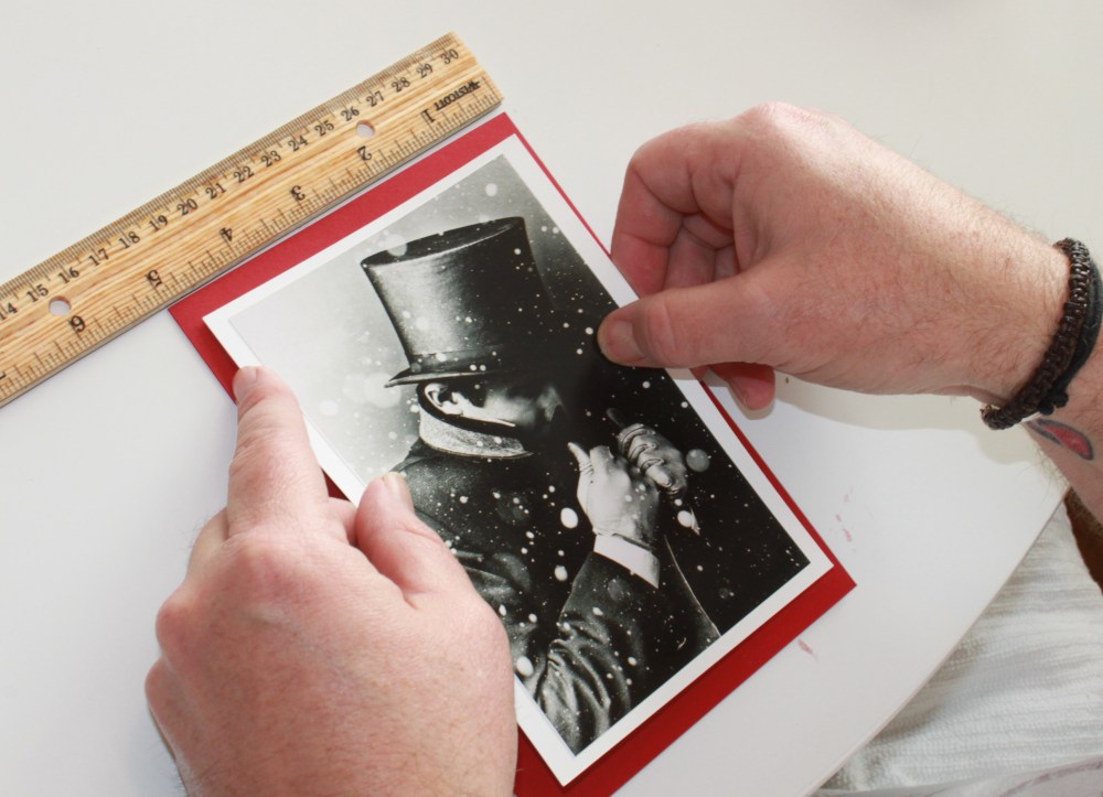 Jamie Tapeing the Images on the Cards