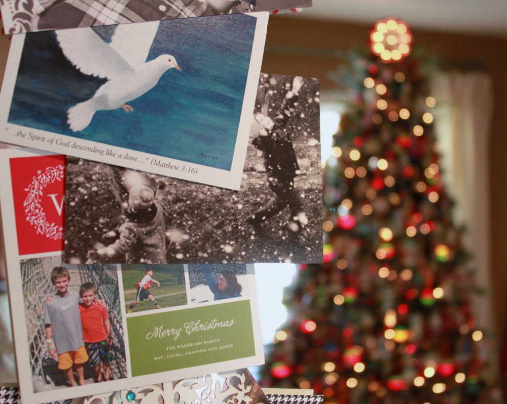 Charming Christmas Cards on Ribbon over the Mirror