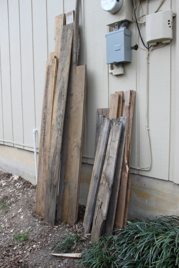Scrap Wood Hoarded on the Side of the House 
