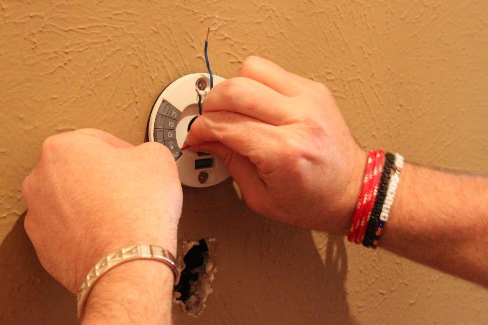 Jamie Attaching the Nest thermostat