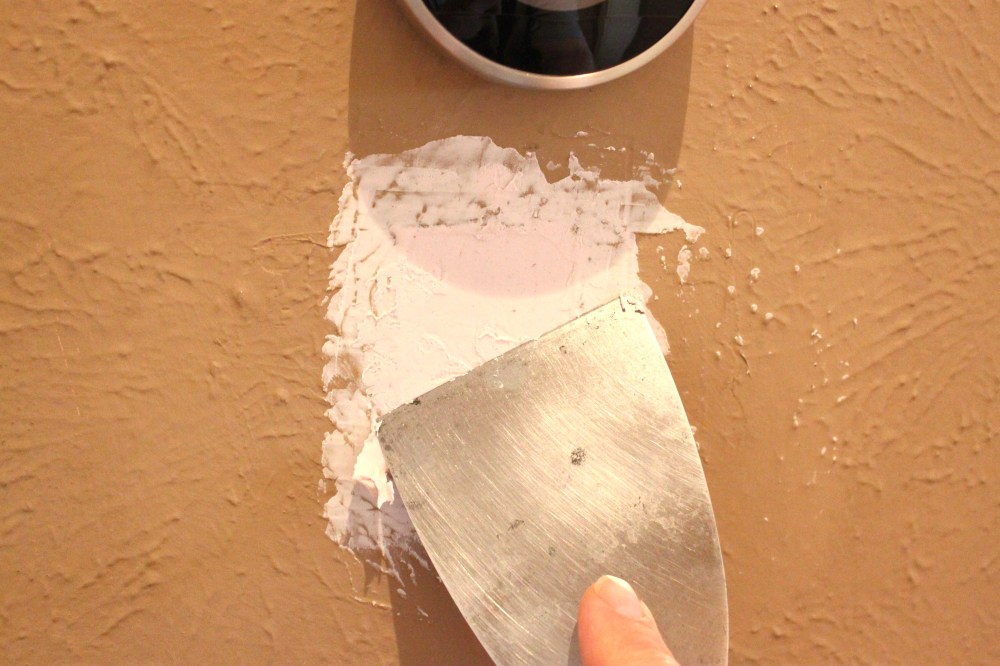 Spreading the Spackle with a Putty Knife