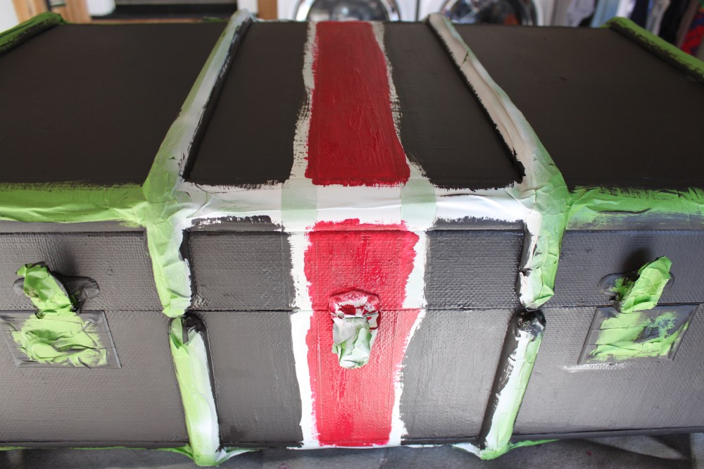 Old trunk Painted Black and Red over Tape