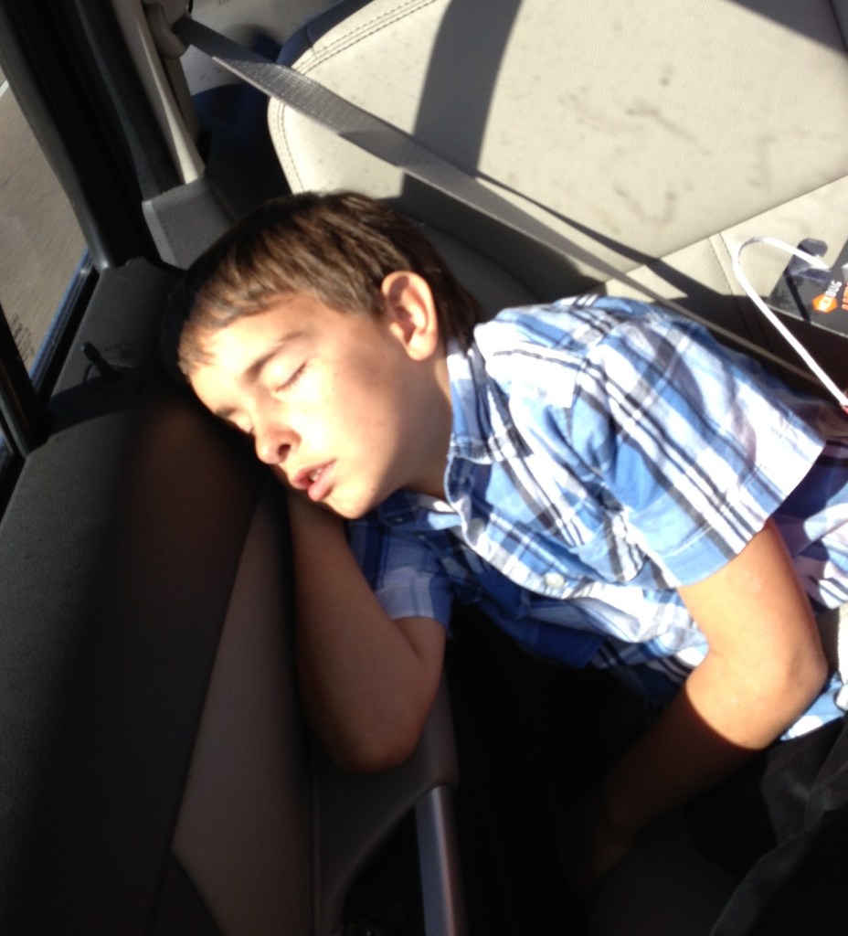 Juston Sleeping in The Car