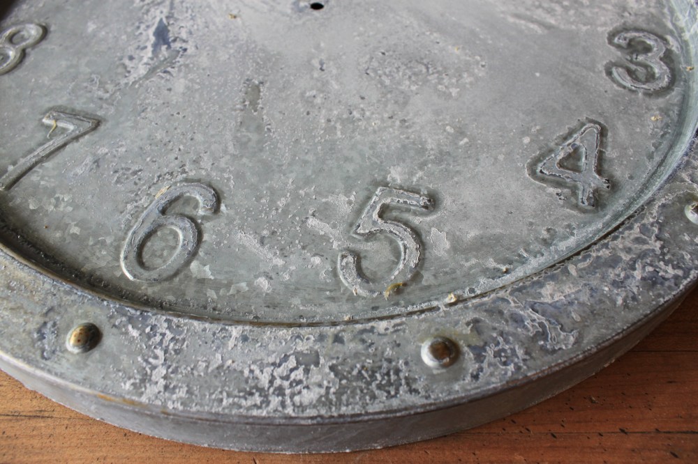 Close up of Weathered Galvanized Clock
