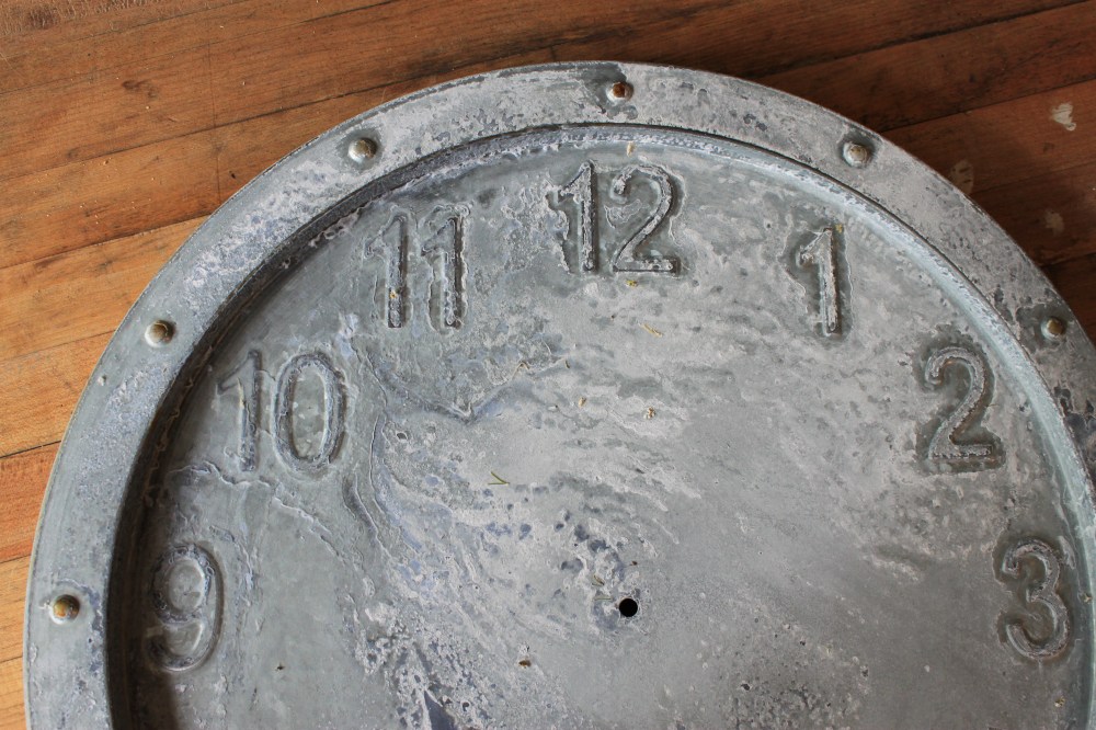 Close up of Weathered Galvanized Clock