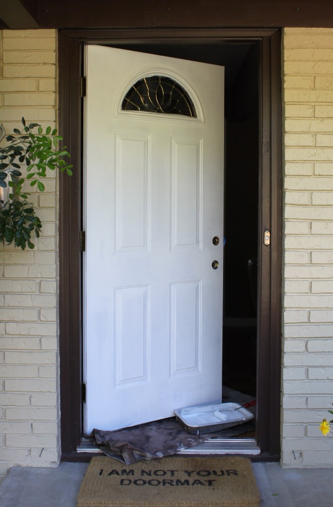 Primed Front Door Waiting to Be Painted Orange