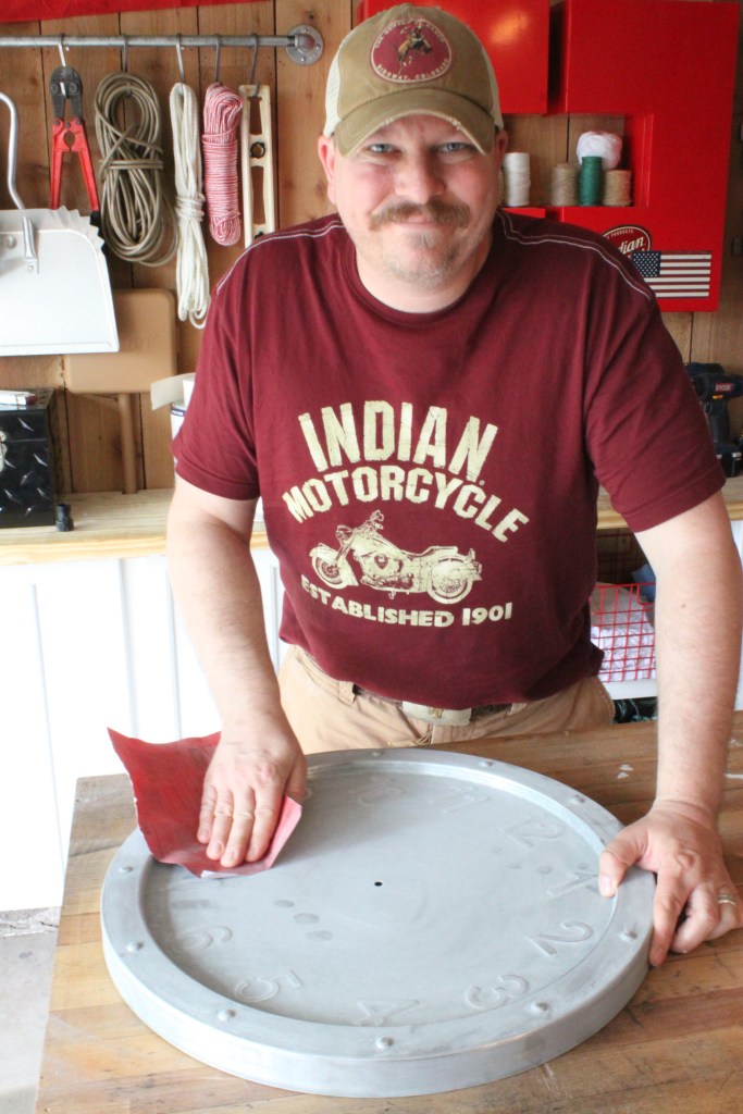 James Sanding the Coating off the Galvanized Clock