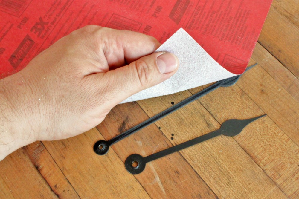 Sandpaper over the Hands to Age them Slightly