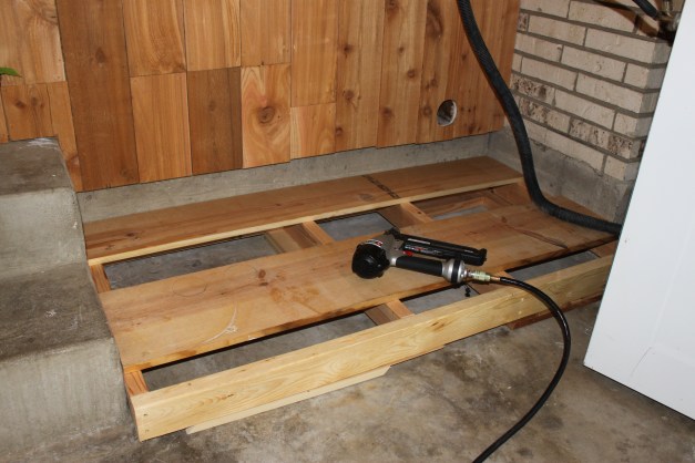 Covering the Frame with Upcycled Shelves