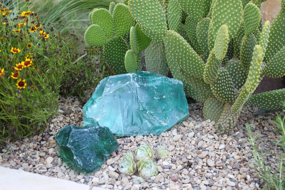 Hunk of Broken Aqua Glass in the Flower Bed