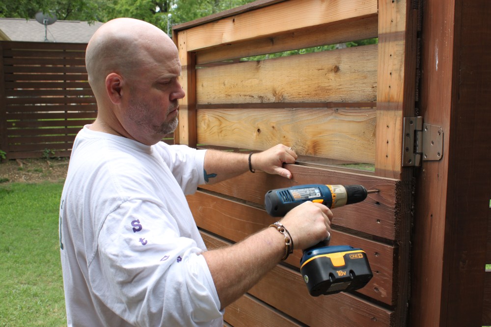 Jamie Removing the Old Slats from the Gate