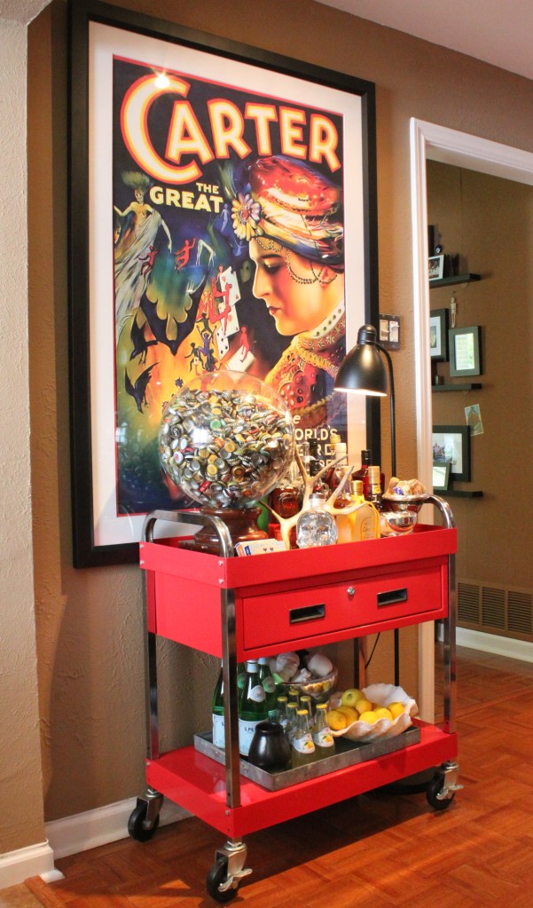 Large Poster of Carter Framed over the BAr Cart