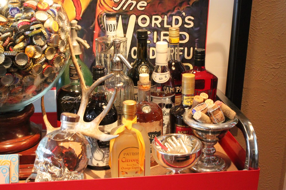 Liquor Bottles on the BAr Under Framed Carter