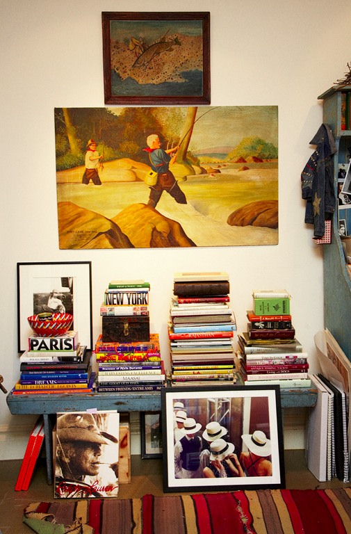 Stacks of Books on Old Blue Bench in Carter's Office