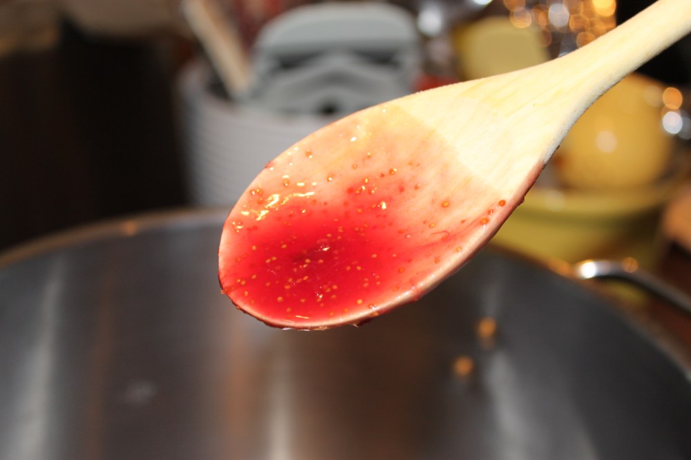 The Fig Jam Coats a Wooden Spoon When it's Thick