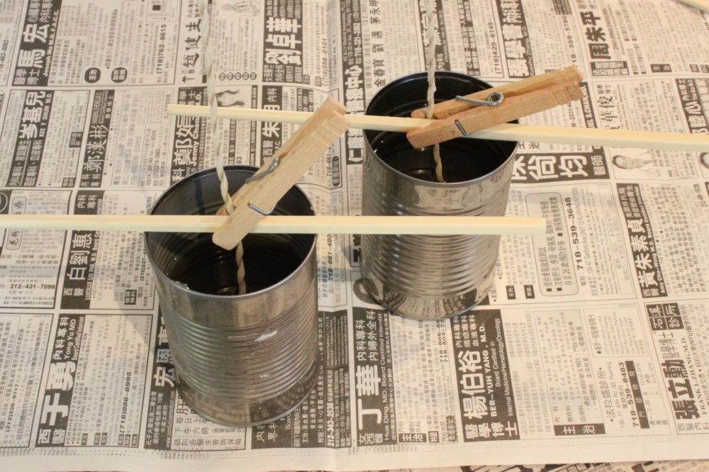 Use Clothes Pins and Chop Sticks to Hole the Wick in Place