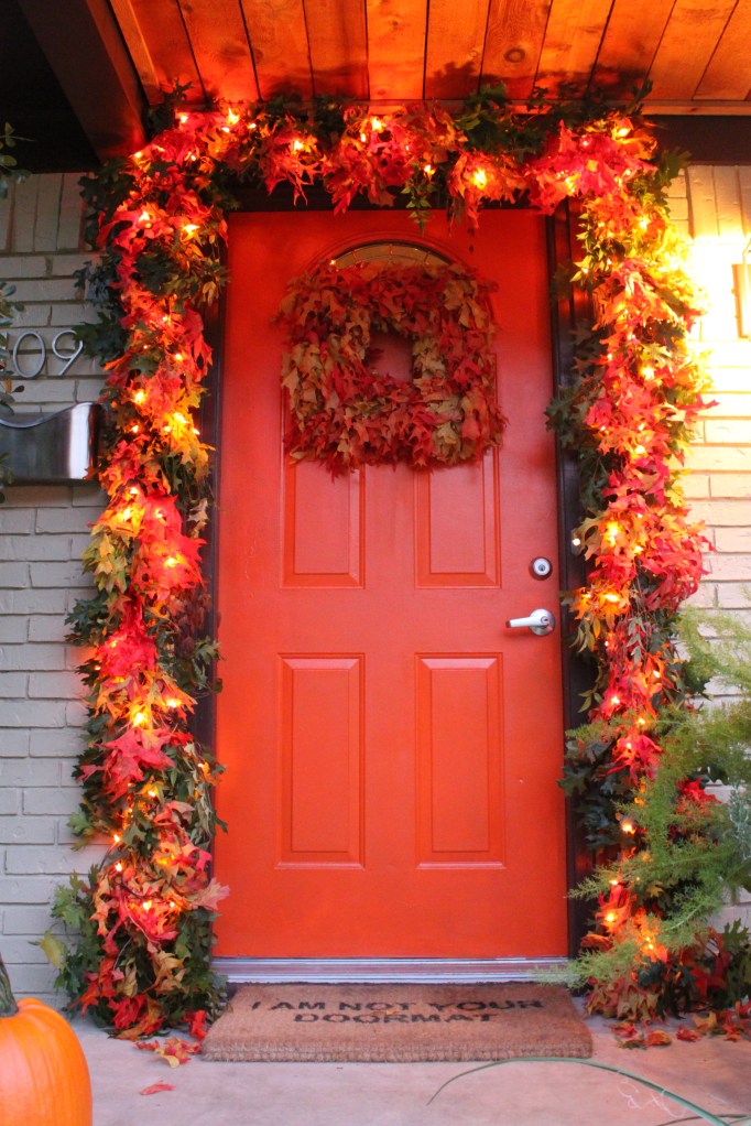 The Cavender Front Door with Orange Leaf Garland
