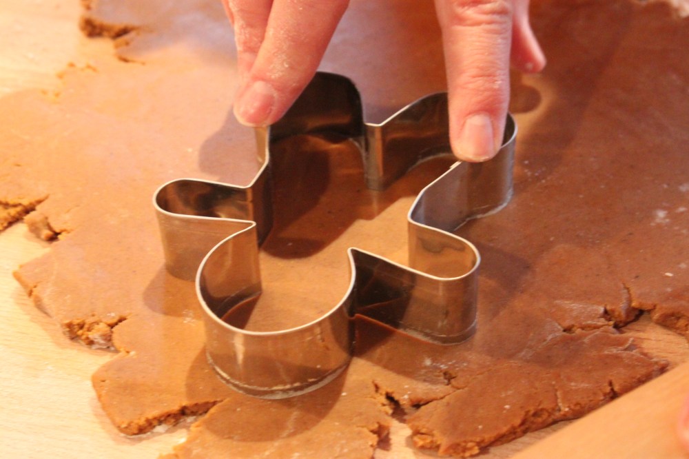 Pressing the Gingerbread Man Coockie Cutter Down