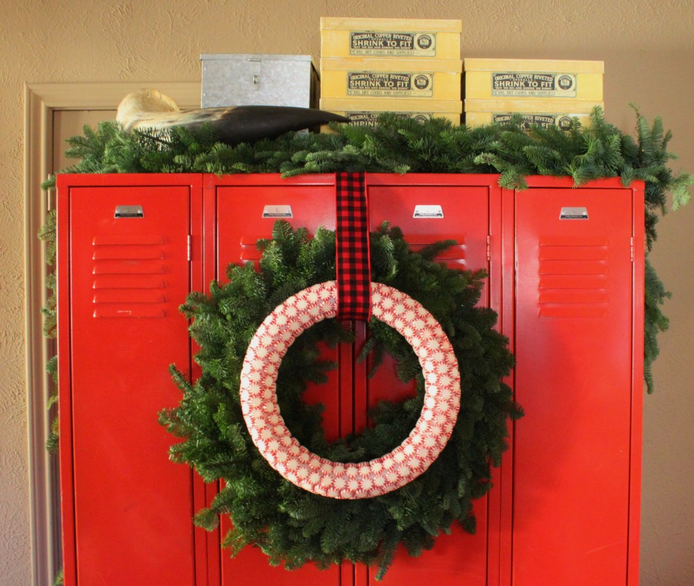 Finished Peppermint Candy Wreath on Red Lockers in the Den