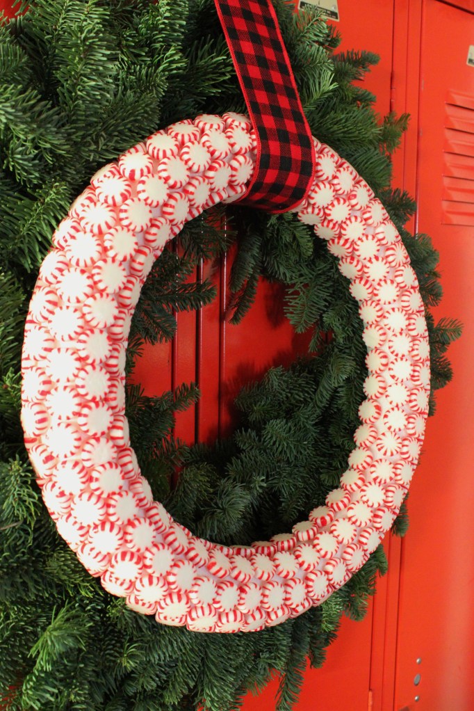 Peppermint Candy Wreath on Green Pine Wreath On Red Lockers
