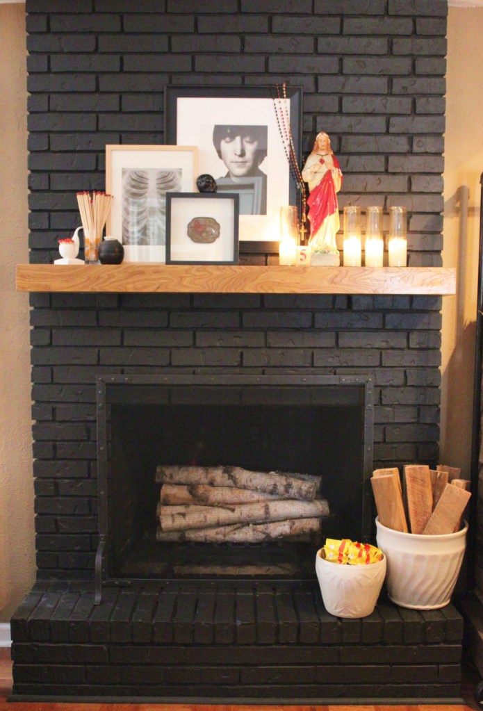 Black Painted Brick Fireplace with New Restoration Hardware Fire Screen