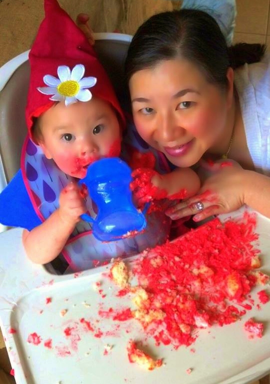 The Birthday Girl with Her Mommy Pausing for some Fluids