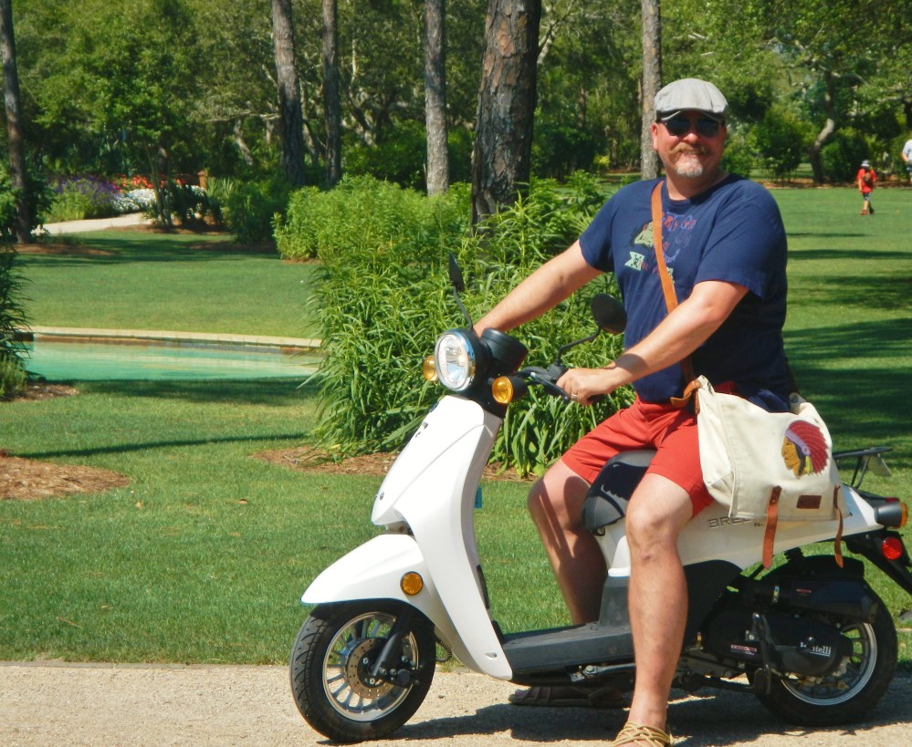 James on the White Vespa