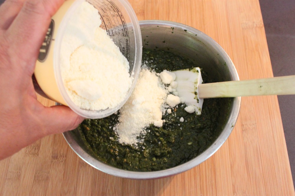 Fold in a Cup of Parmasan Cheese to teh Basil Mixture