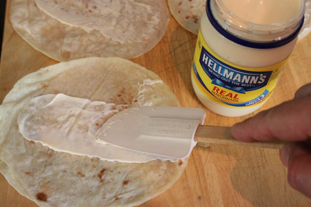 Slather a Small Amount of Mayonaise Across the Tortilla