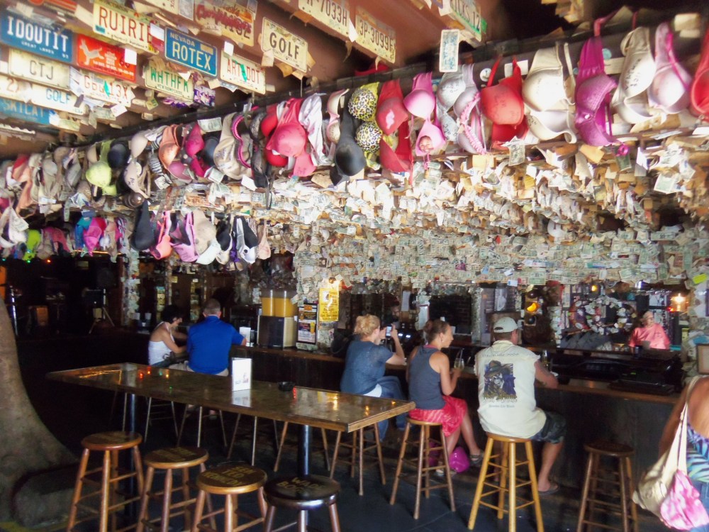 Bras Galore Hanging from the Ceiling of Captain Tony's