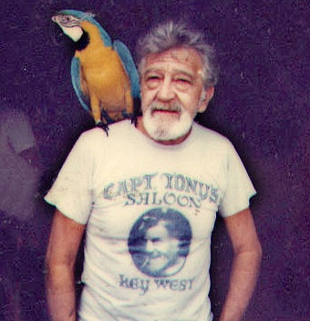 Captain Tony with a Macaw on his Shoulder