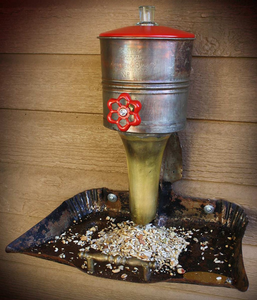 Red Top Dustpan Bird Feeder by the Gadget Sponge