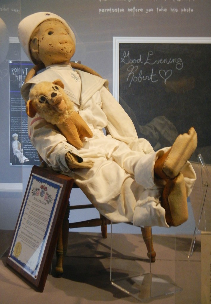 Robert the Doll Under Glass