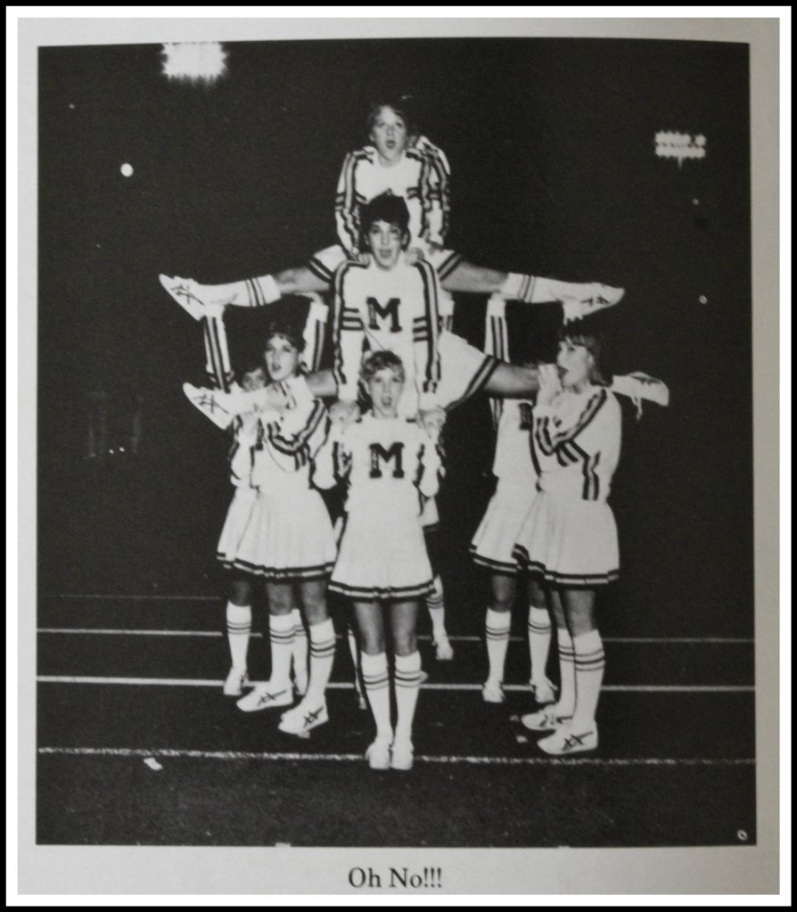 Cheerleaders Doing What They Do Best