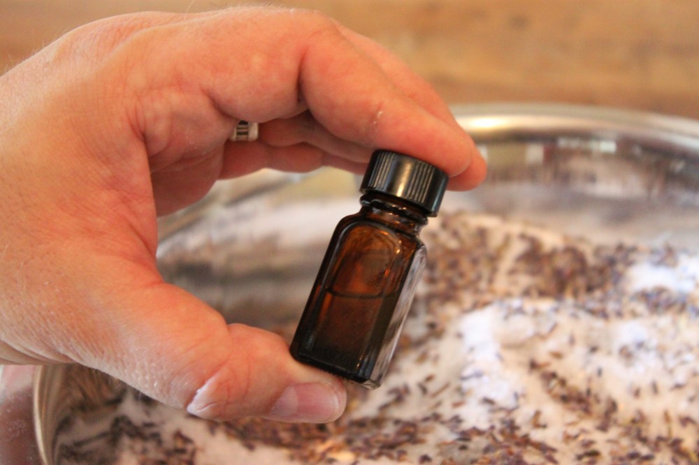 Lavender Essential Oli Comes in a Small Brown Bottle