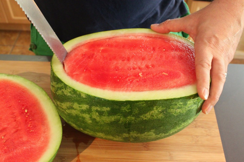 Use a serated Knife to Cut out the Watermelon
