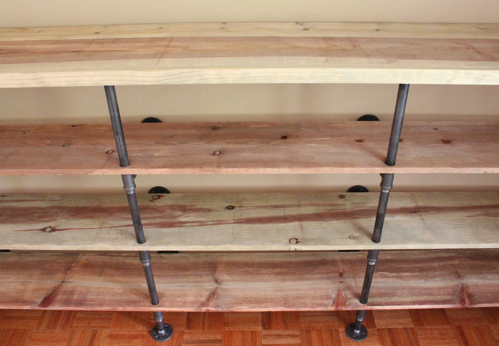 Looking Down on Our Aged Plumbing Pipe Shelves