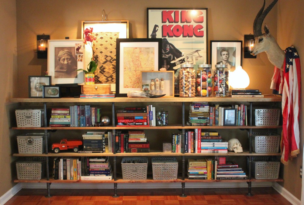Our Finished Plumbing Pipe Shelves in the Living Room