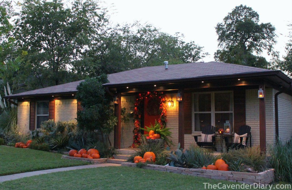 The Cavender House for October with Pumpkins in the Flower Beds
