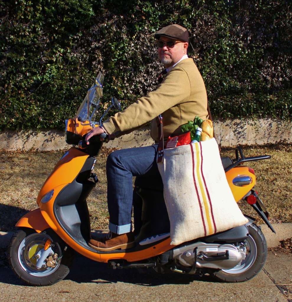 Jamie on the Scooter with the Grain Sack Grocery Bag