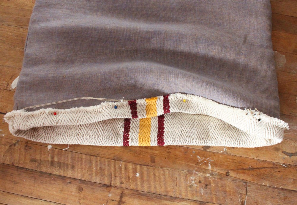 Slip the Linen Sack Ovee the Gran Sack and Tuck Under the Folded Down Edge