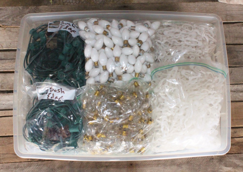 Tub full of Bulbs, Cords and Clips in Labled Bags