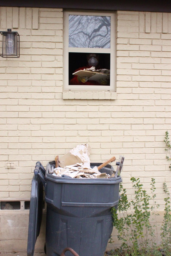Trash Can Under the Bathroom Window