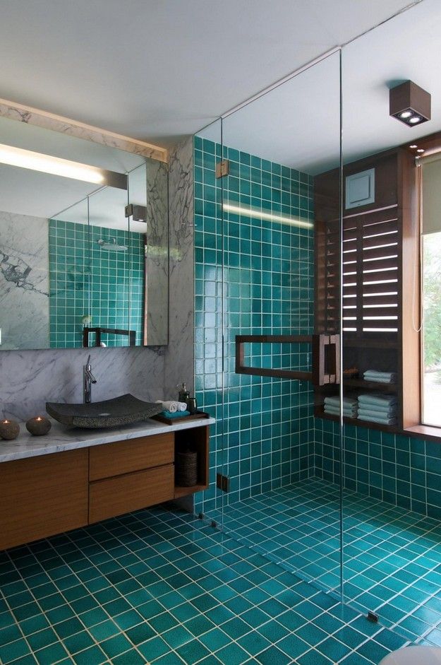 Glazed Turquoise Bathroom with Glass Enclosed Shower